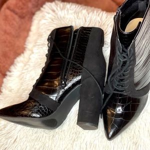 Black pointed toe booties